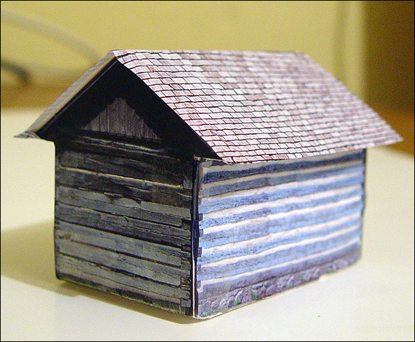 Paper cabin, back and side